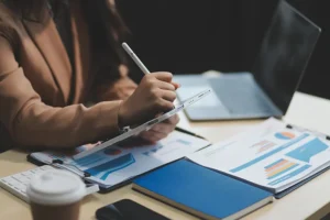 writing on a tablet | integrated facilities management
